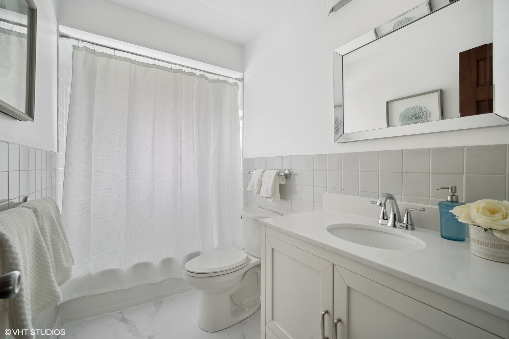 1345 Tinker Way Glenview, IL 60025 - Photo 13 of 25 a bathroom with a sink a toilet and shower