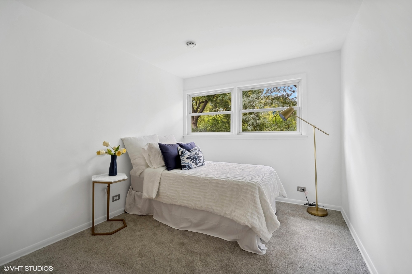 1345 Tinker Way Glenview, IL 60025 - Photo 15 of 25 a bedroom with a bed and a window