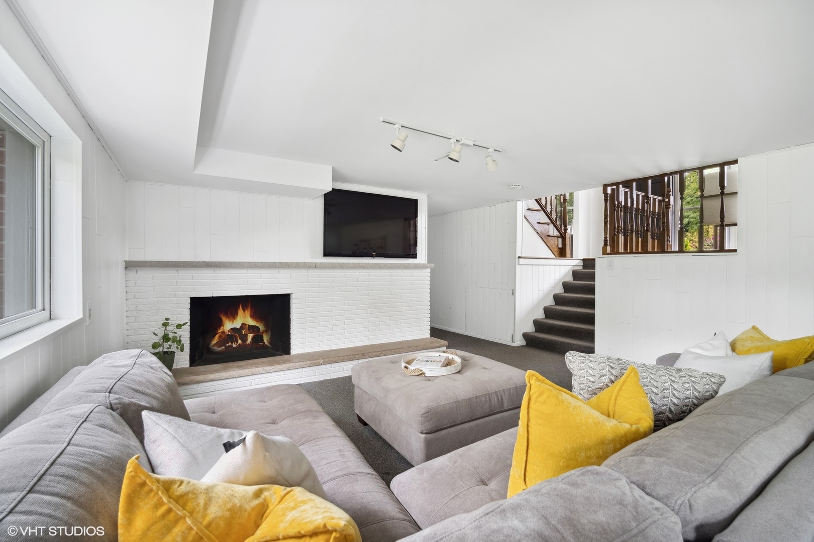 1345 Tinker Way Glenview, IL 60025 - Photo 19 of 25 a living room with furniture and a fireplace
