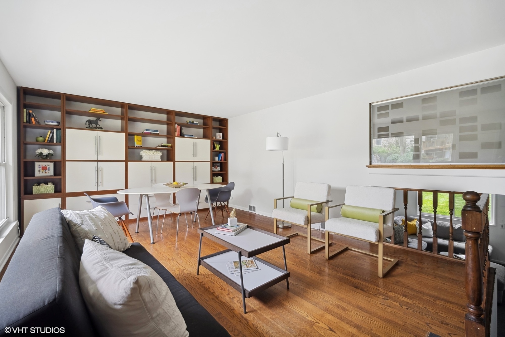 1345 Tinker Way Glenview, IL 60025 - Photo 7 of 25 a living room with furniture and a floor to ceiling window