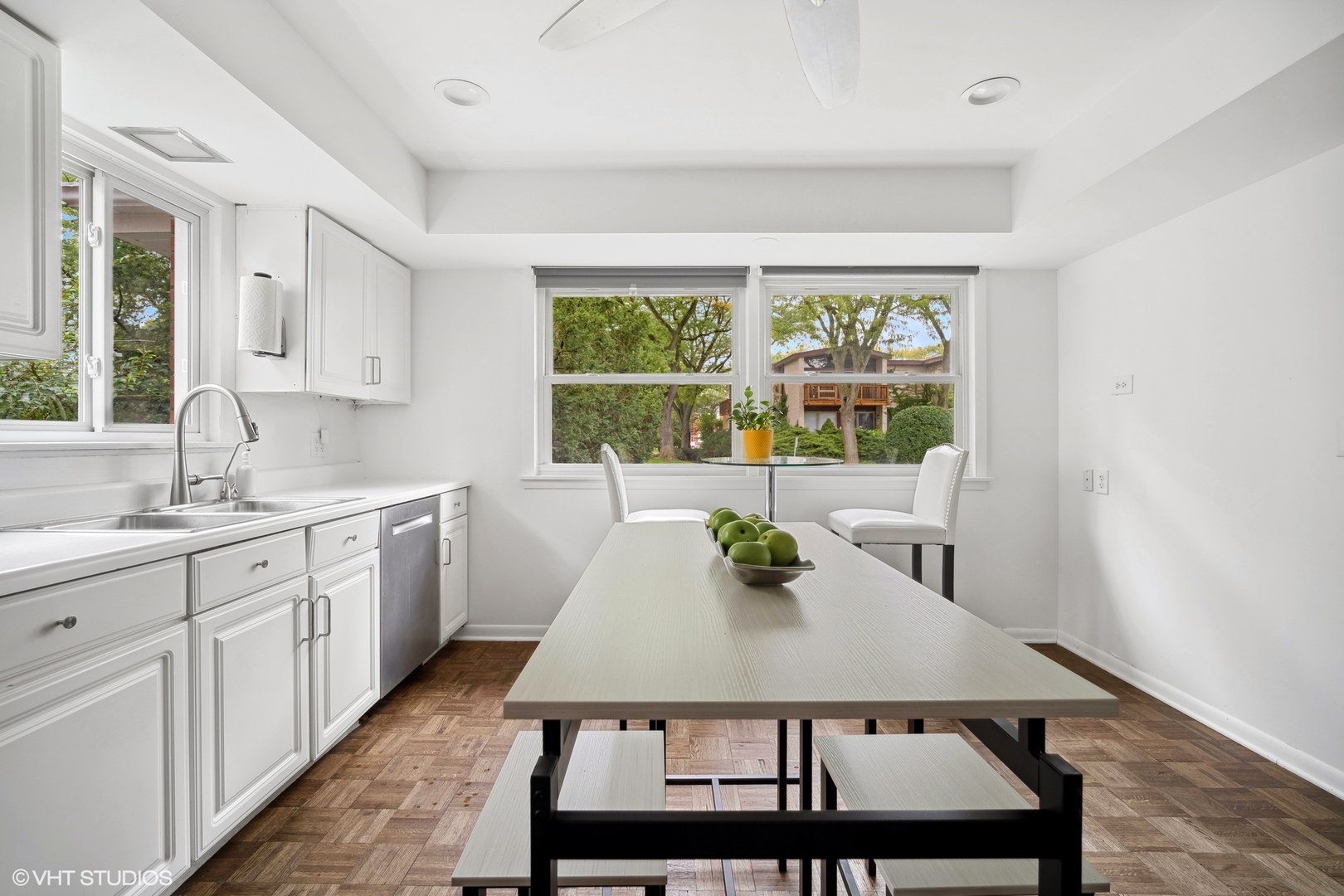 1345 Tinker Way Glenview, IL 60025 - Photo 10 of 25 a kitchen with a table a sink and cabinets