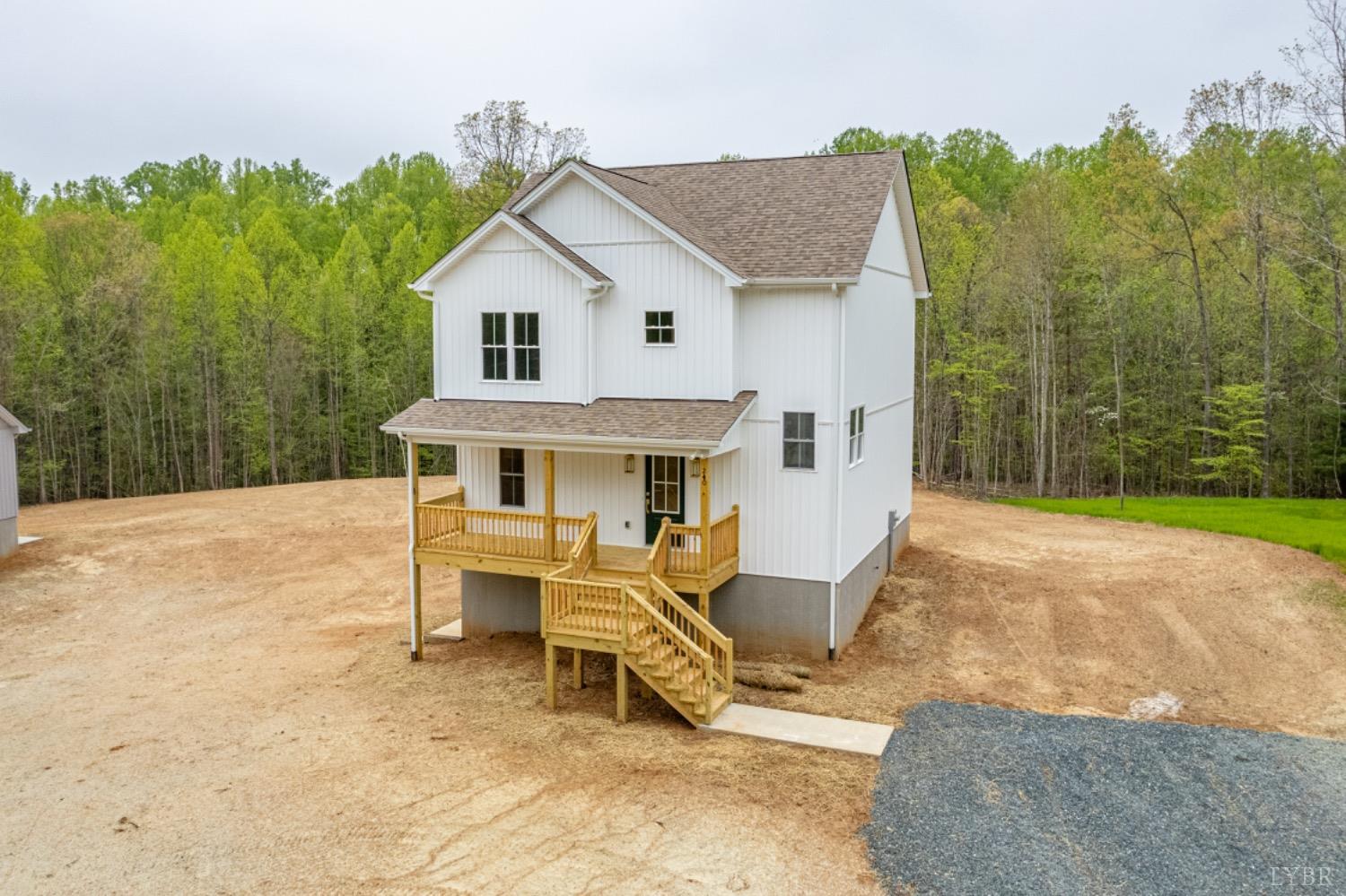 240 Ned Brown Road Amherst, VA 24521 - Photo 1 of 59 a view of a house with backyard and porch
