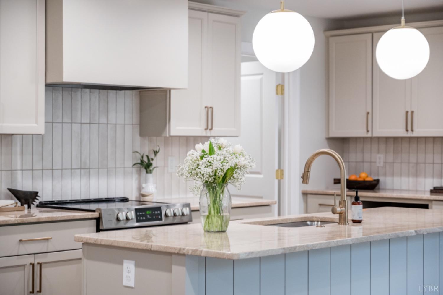 240 Ned Brown Road Amherst, VA 24521 - Photo 25 of 59 a kitchen with stainless steel appliances granite countertop a sink a stove and a wooden cabinets
