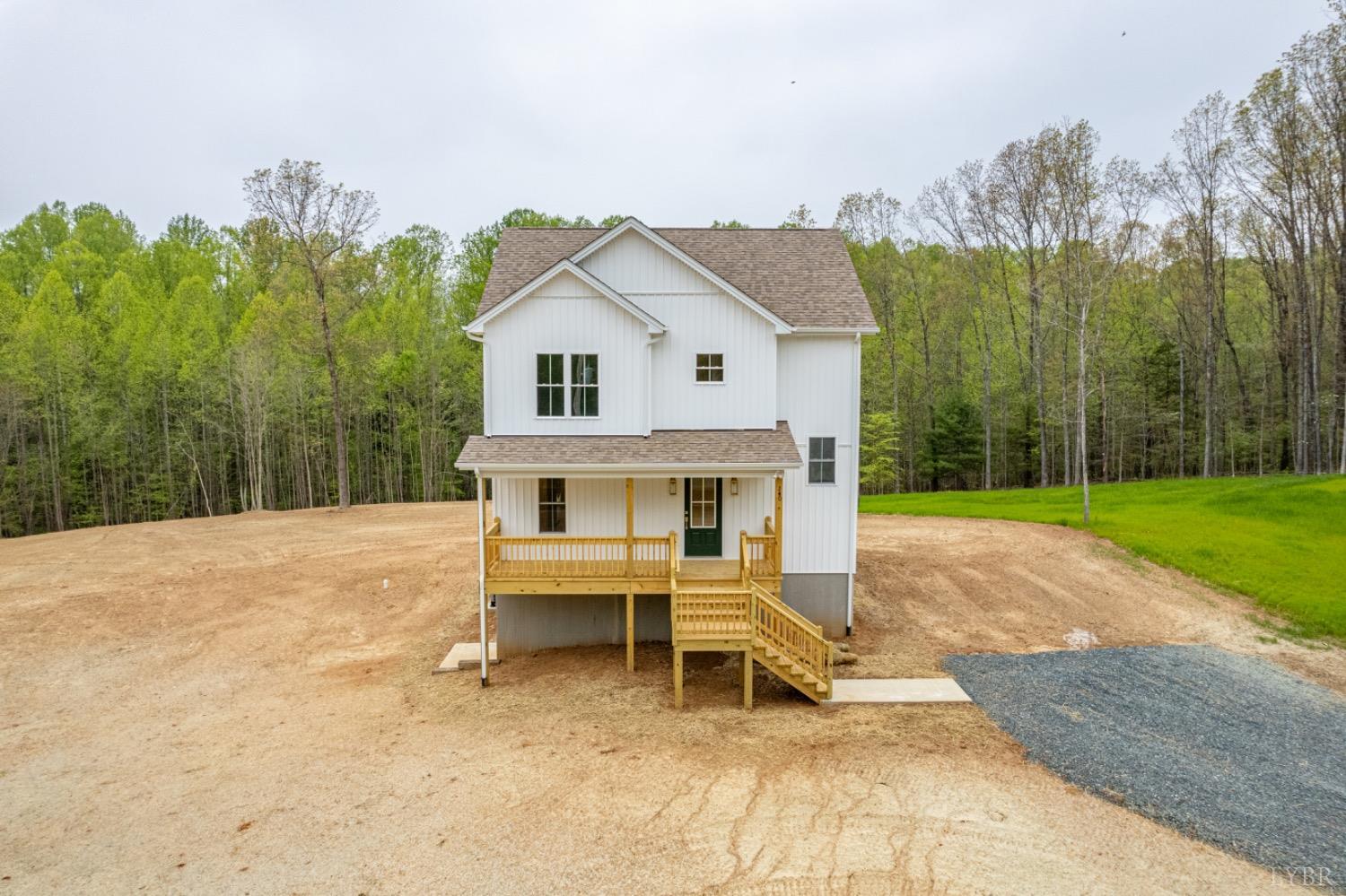 240 Ned Brown Road Amherst, VA 24521 - Photo 3 of 59 a view of a house with a yard and sitting area