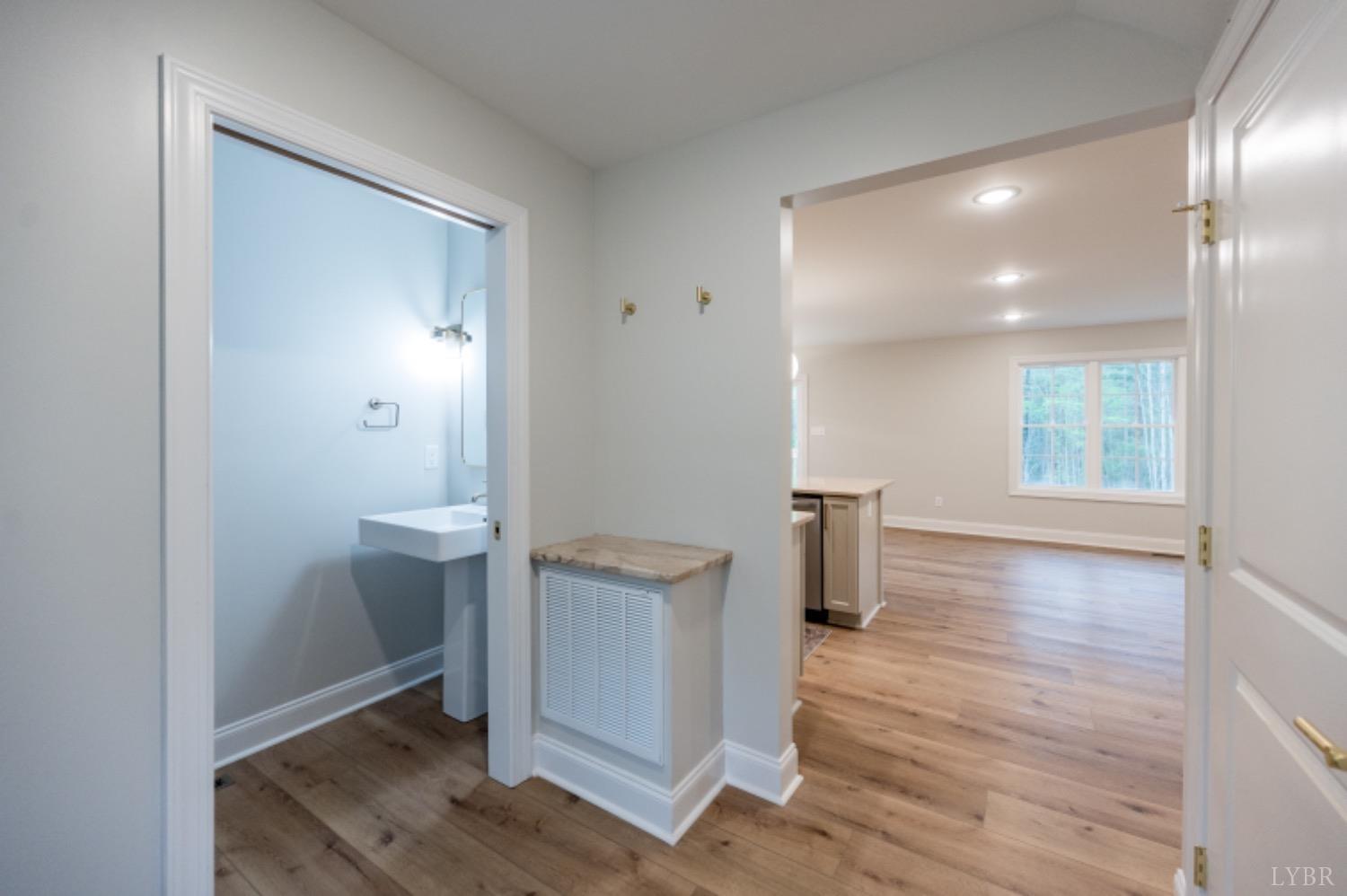 240 Ned Brown Road Amherst, VA 24521 - Photo 4 of 59 wooden floor in an empty room with a window