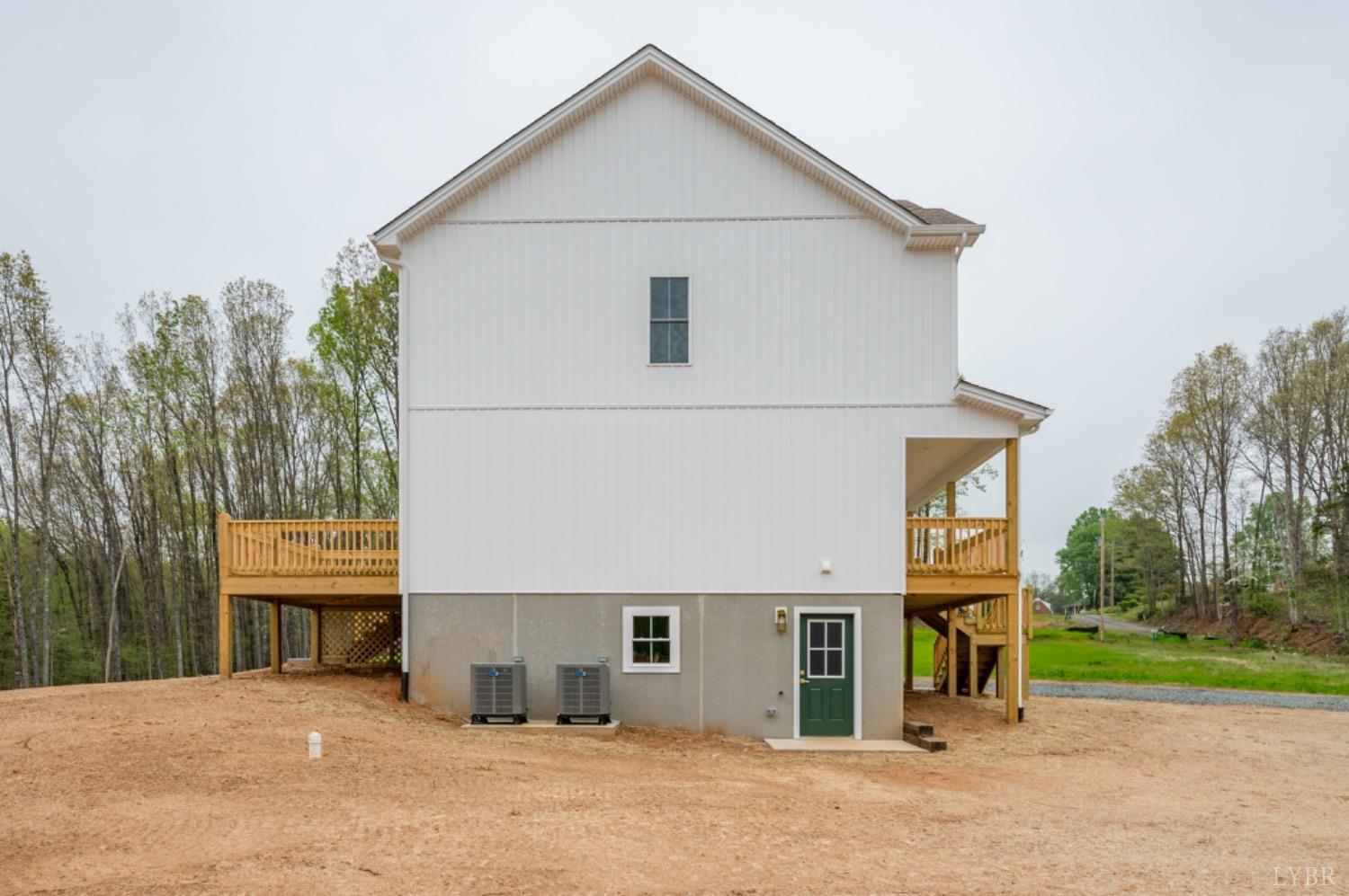 240 Ned Brown Road Amherst, VA 24521 - Photo 53 of 59 a view of a house with a yard and garage
