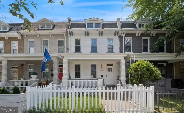 front view of a house with a small yard