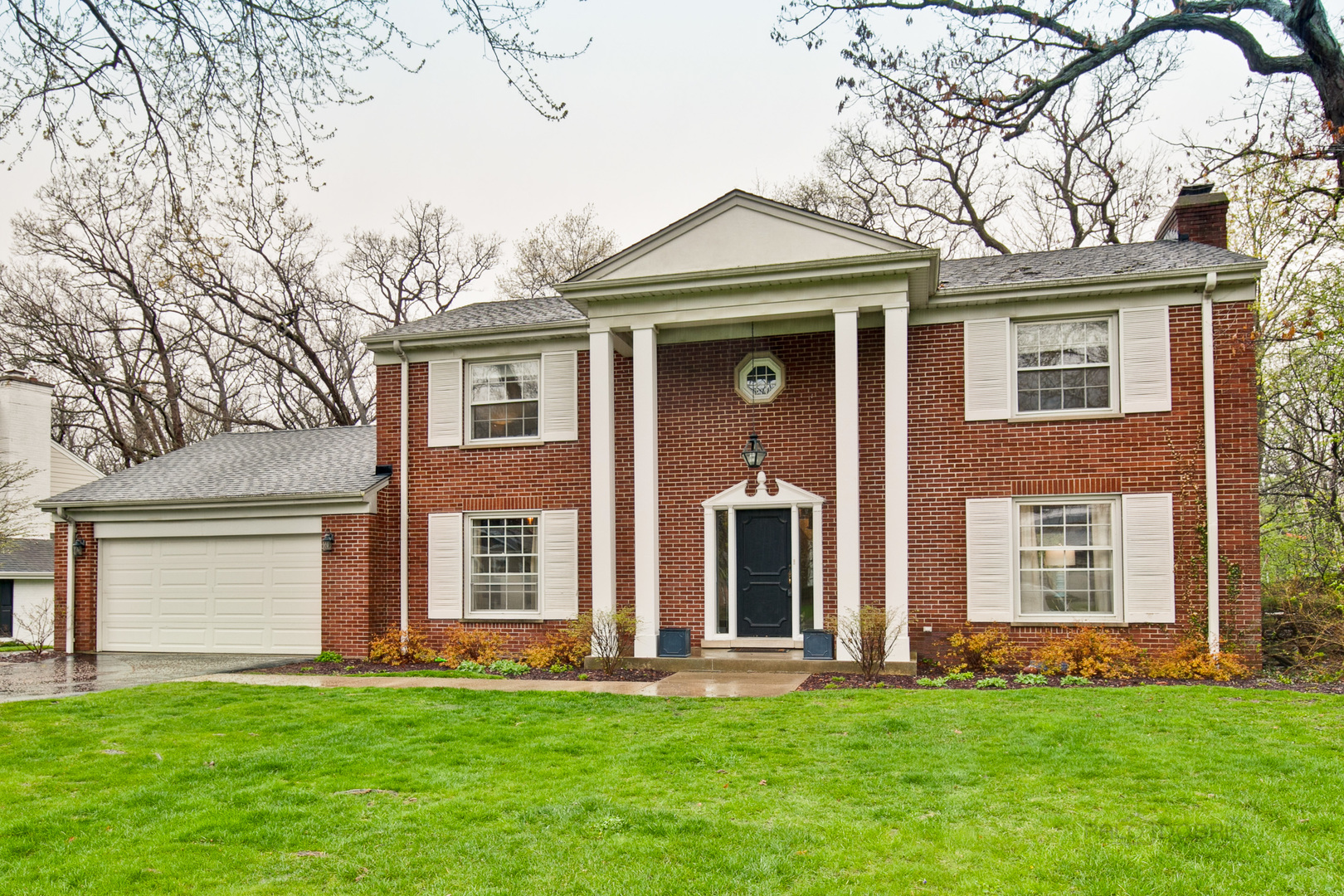 1040 Forest Hill Road Lake Forest, IL 60045 - Photo 1 of 30 front view of a house with a yard