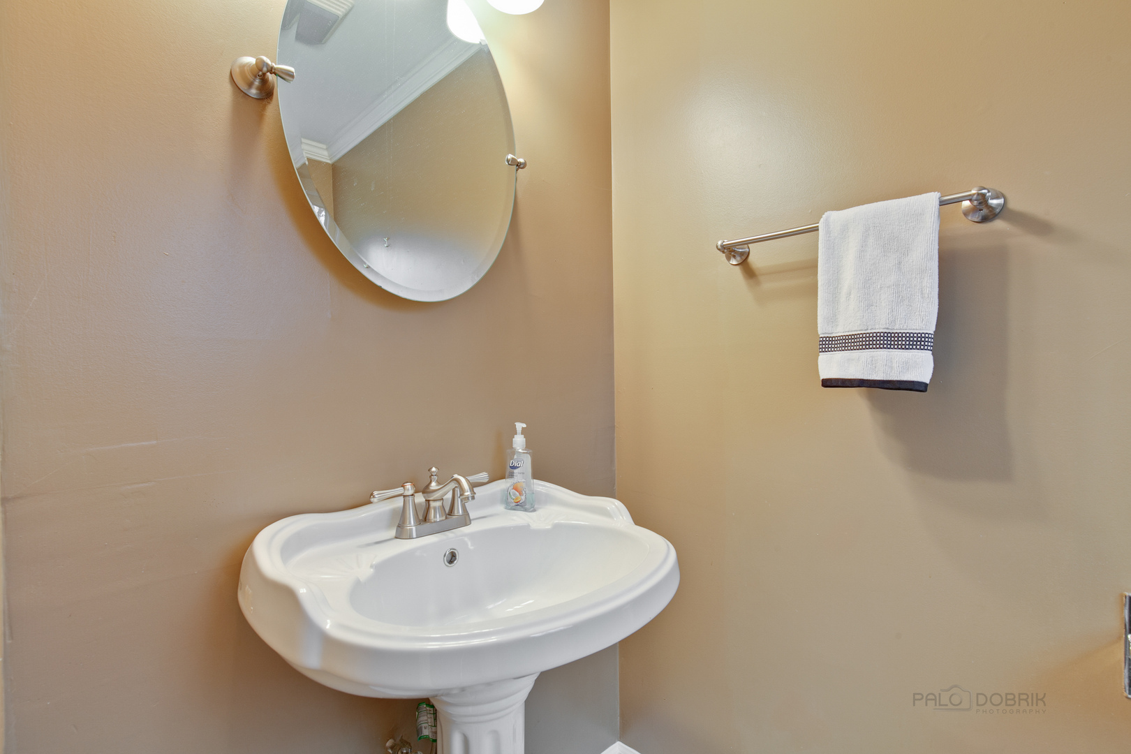 1040 Forest Hill Road Lake Forest, IL 60045 - Photo 15 of 30 a bathroom with a sink and a mirror