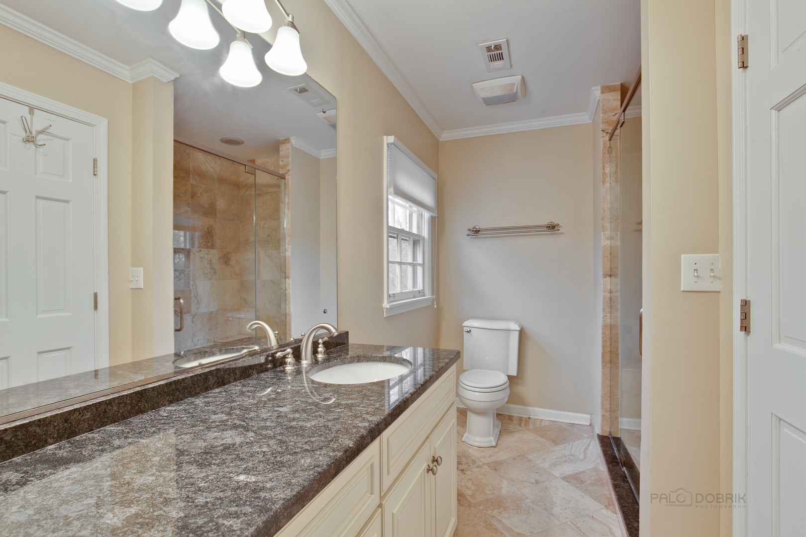 1040 Forest Hill Road Lake Forest, IL 60045 - Photo 19 of 30 a bathroom with a granite countertop sink a toilet and a mirror