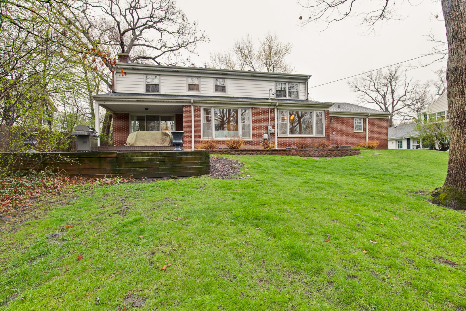1040 Forest Hill Road Lake Forest, IL 60045 - Photo 29 of 30 a front view of house with yard and trees