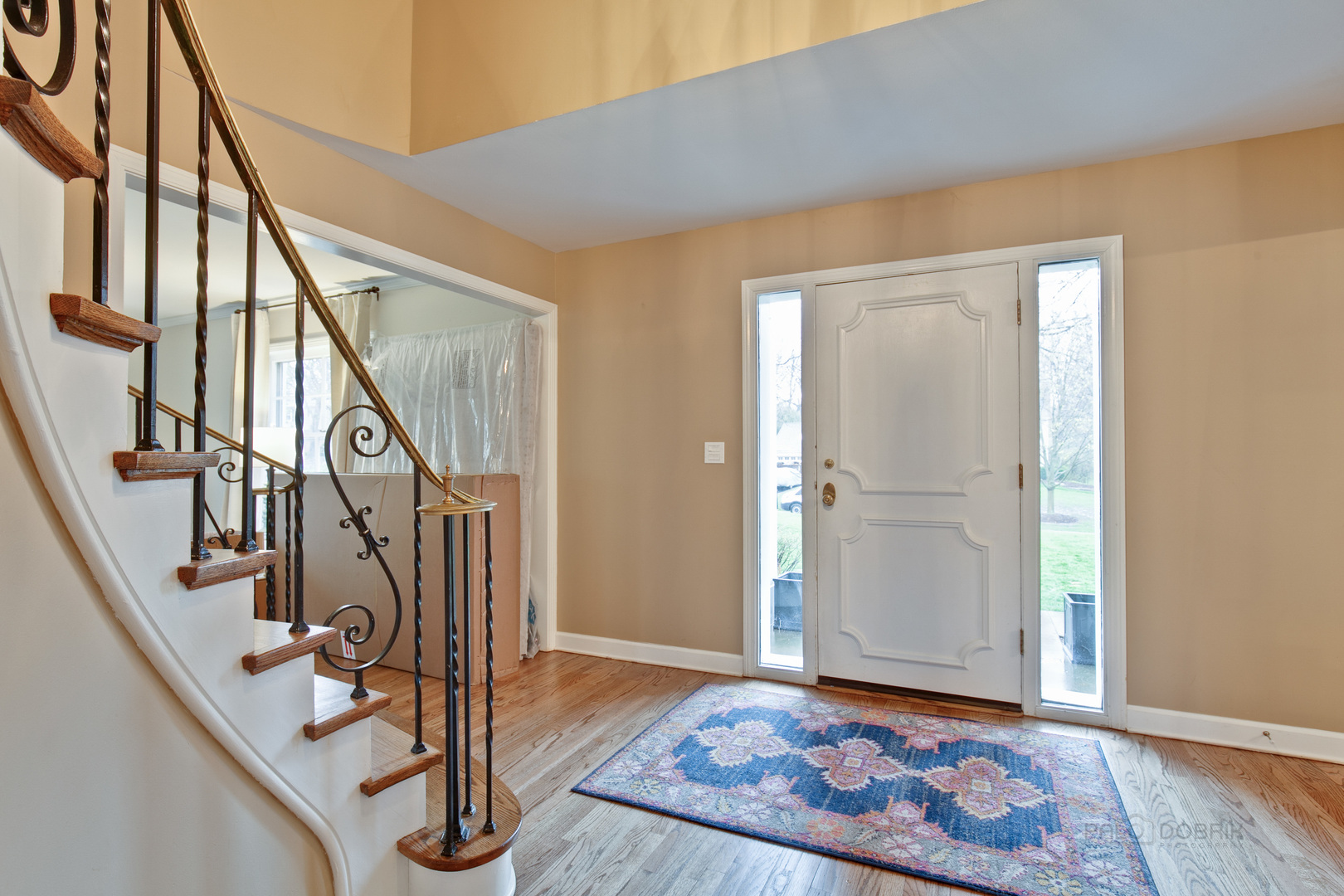 1040 Forest Hill Road Lake Forest, IL 60045 - Photo 3 of 30 a view of an entryway with wooden floor