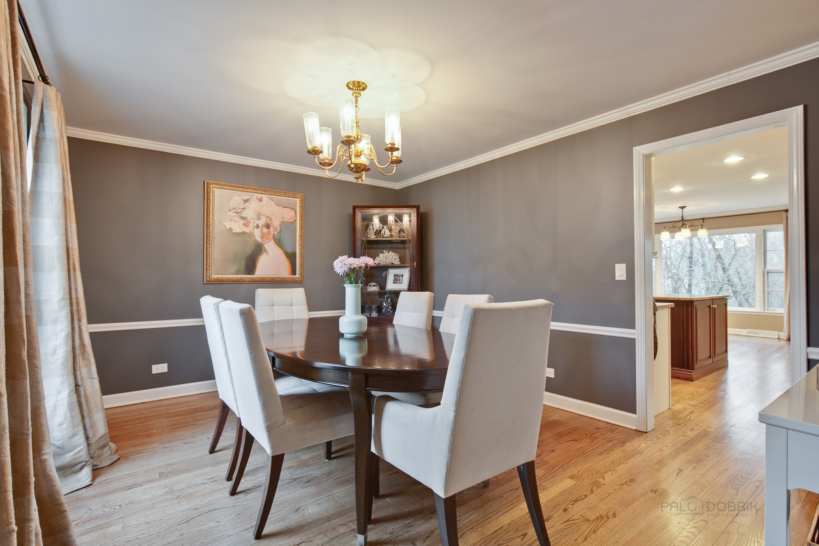 1040 Forest Hill Road Lake Forest, IL 60045 - Photo 5 of 30 a view of a dining room with furniture wooden floor and chandelier