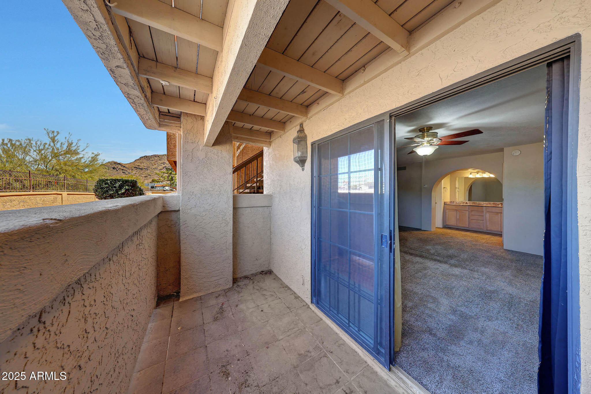10410 North Cave Creek Road, Unit 1011 Phoenix, AZ 85020 - Photo 27 of 41 a view of hallway with stairs