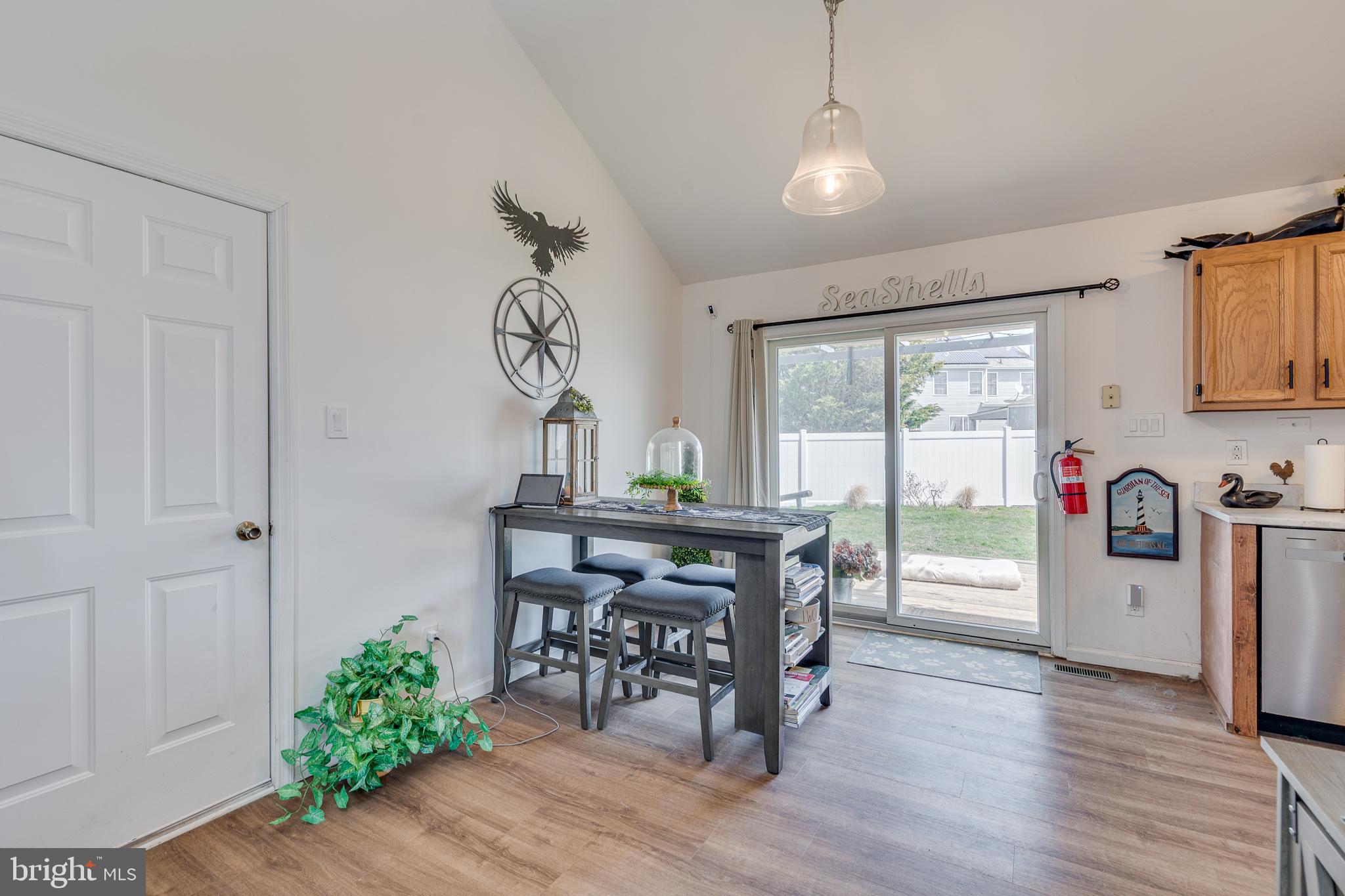 1030 Center Street Tuckerton, NJ 08087 - Photo 11 of 42 a view of a dining room with furniture window and wooden floor