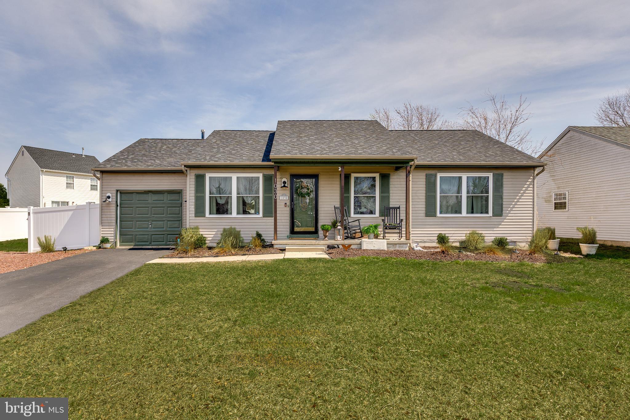 1030 Center Street Tuckerton, NJ 08087 - Photo 2 of 42 a front view of a house with yard patio and fire pit
