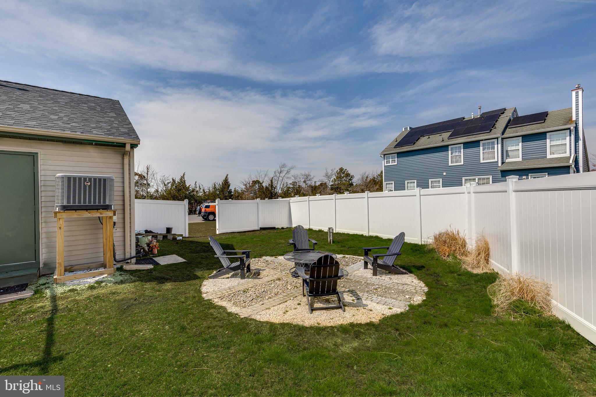1030 Center Street Tuckerton, NJ 08087 - Photo 33 of 42 a view of a house with backyard porch and sitting area