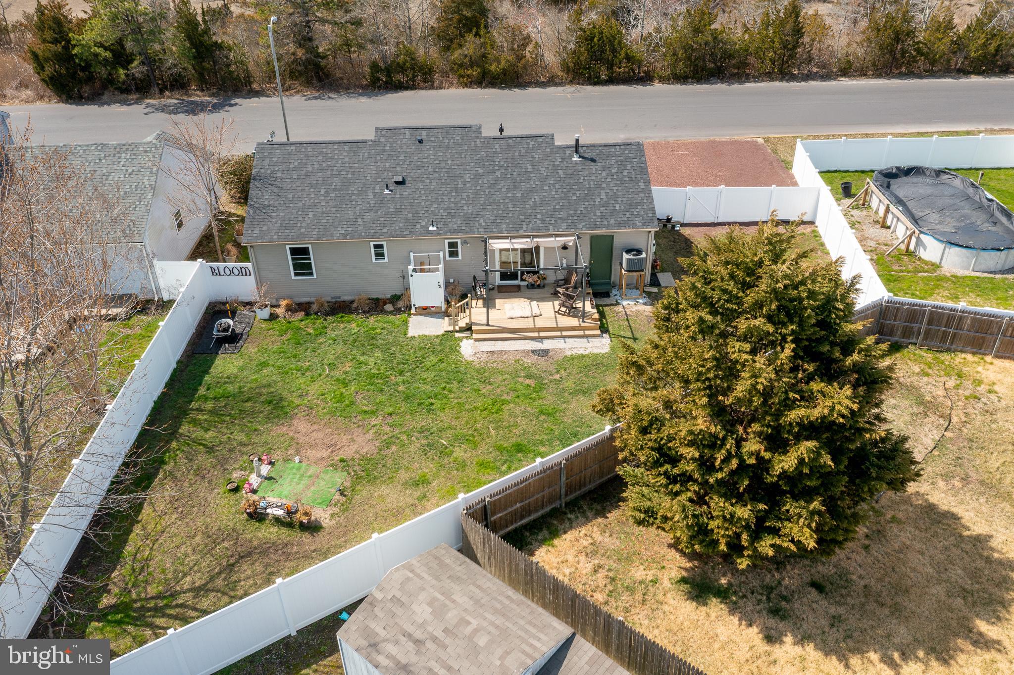 1030 Center Street Tuckerton, NJ 08087 - Photo 34 of 42 a view of a yard with chairs
