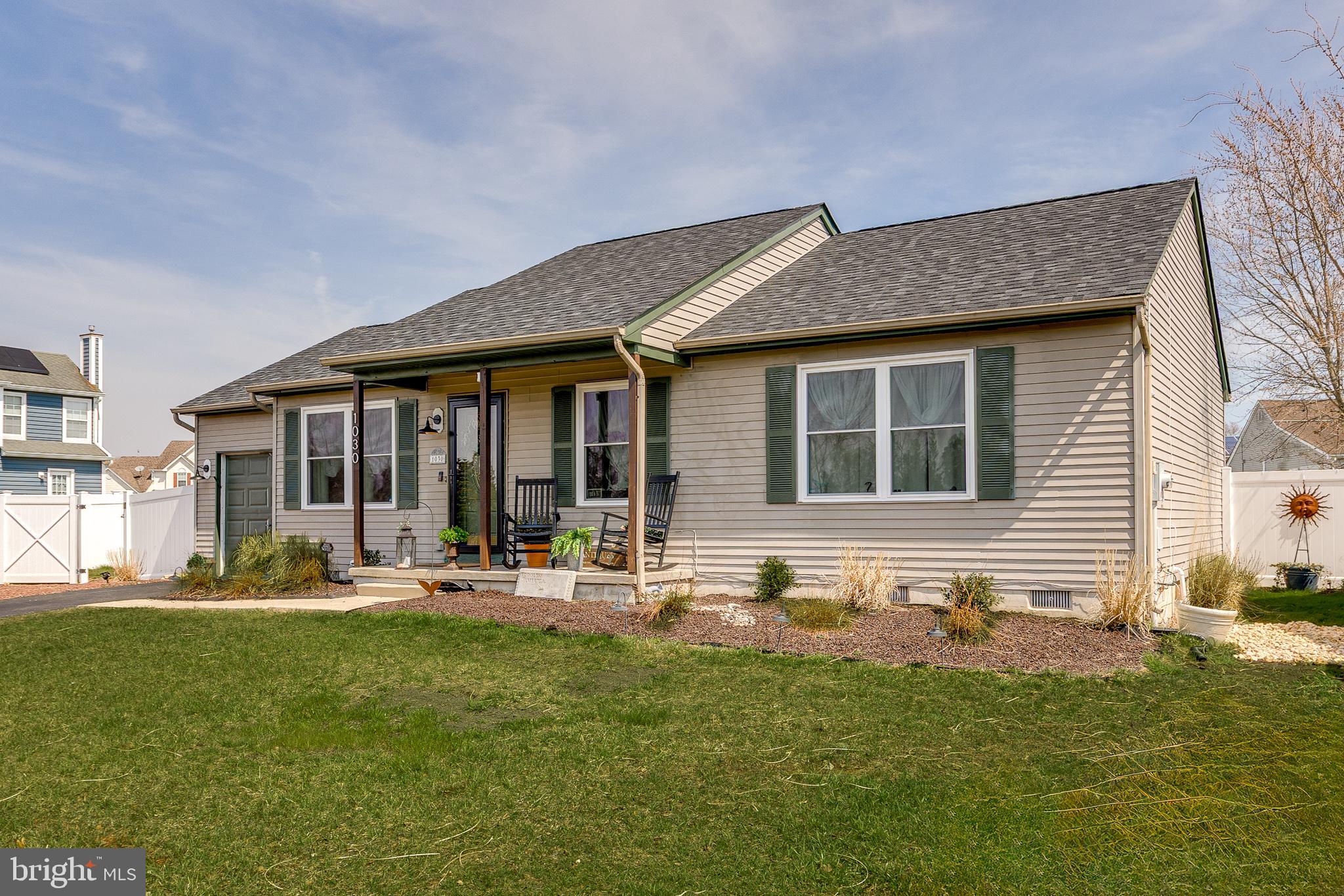 1030 Center Street Tuckerton, NJ 08087 - Photo 4 of 42 a front view of house with outdoor seating and yard