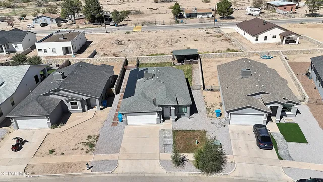 an aerial view of a city with beach