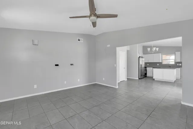 a view of a kitchen with a sink and dishwasher cabinet