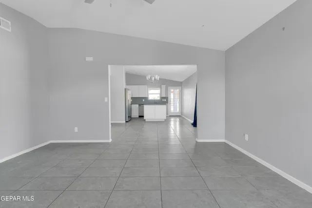 a view of a electric room and closet in a room