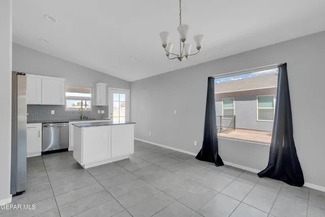 a view of kitchen and windows