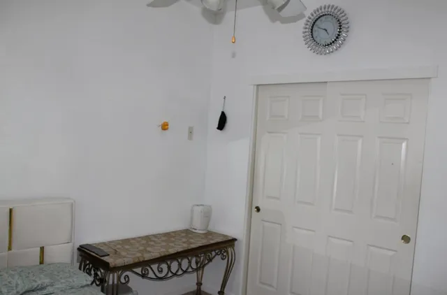 a view of a room with rack on the wall