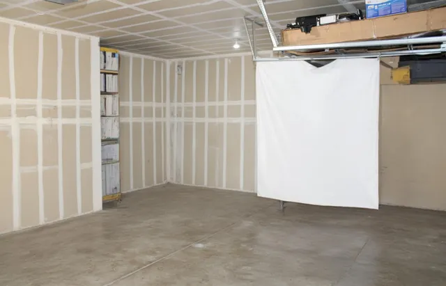 a view of a backyard of the house