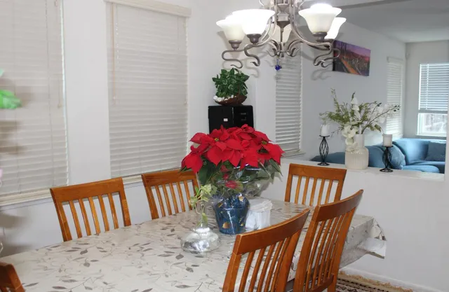 a view of walk in closet with clothes