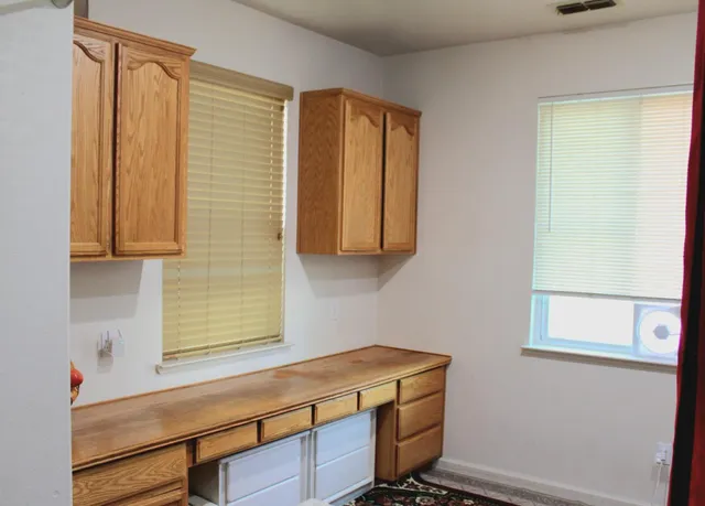 a room with storage and utility