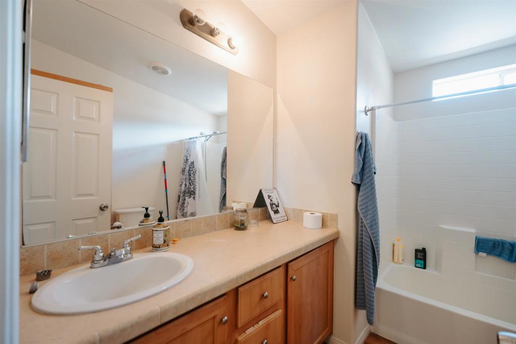4740 Flying H Road Twentynine Palms, CA 92277 - Photo 10 of 19 a bathroom with a sink and a mirror