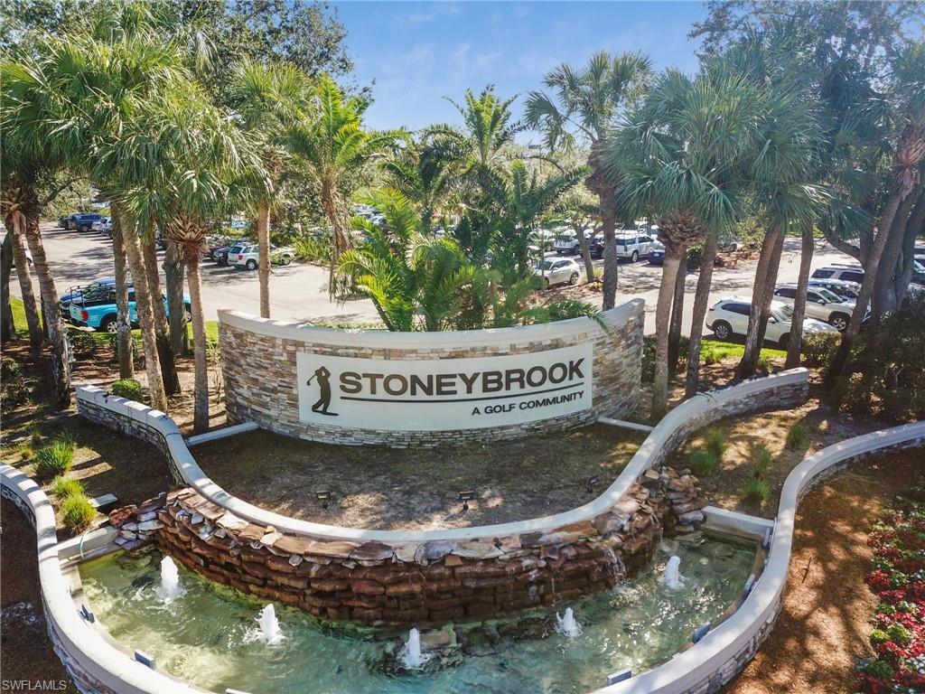 21629 Windham Run Estero, FL 33928 - Photo 17 of 23 a view of a swimming pool with a sitting area