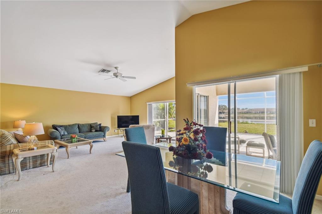 21629 Windham Run Estero, FL 33928 - Photo 8 of 23 a living room with furniture and a large window