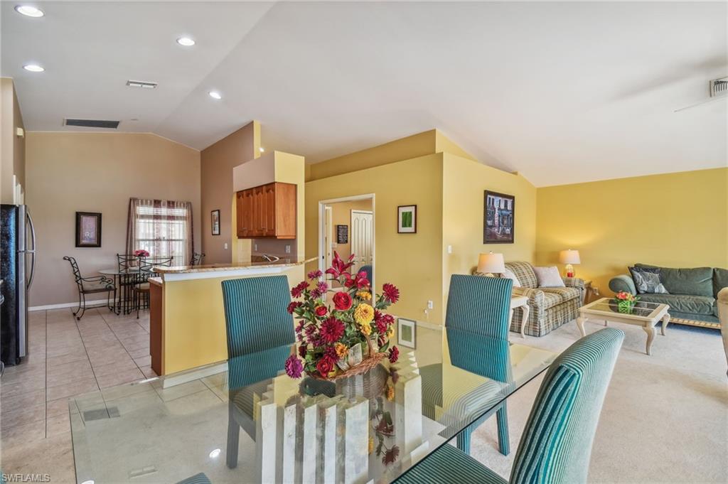 21629 Windham Run Estero, FL 33928 - Photo 9 of 23 a living room with furniture and a large window
