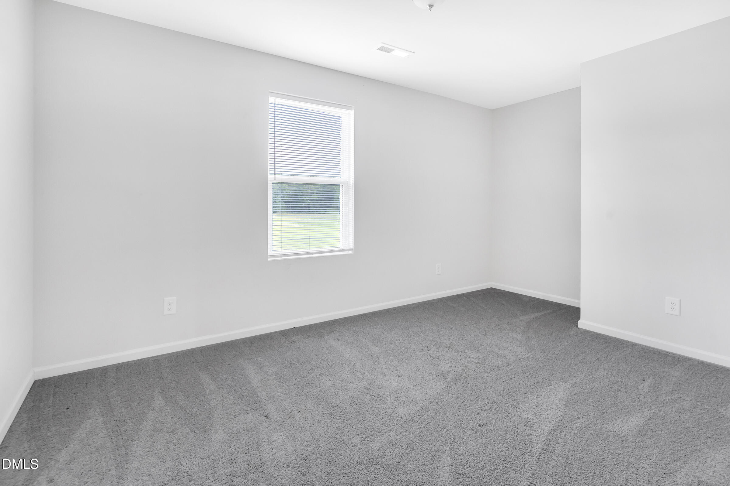 3146 Stoney Hill Church Road Bailey, NC 27807 - Photo 17 of 26 an empty room with a window