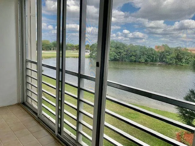 a view of swimming pool from balcony
