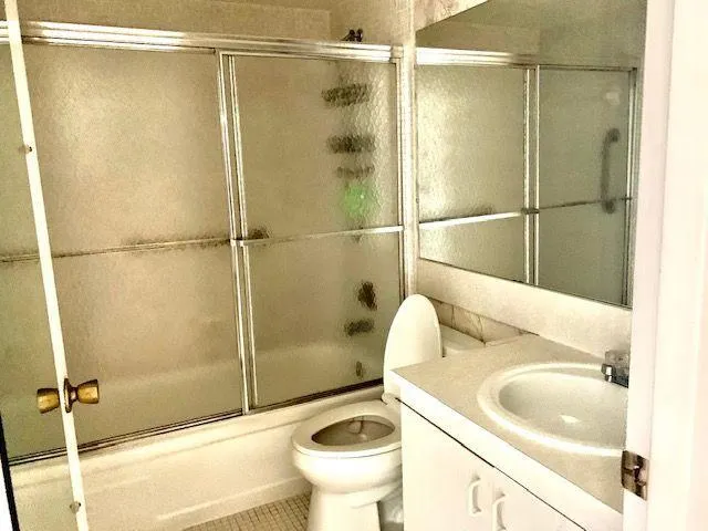 a bathroom with a sink and a shower