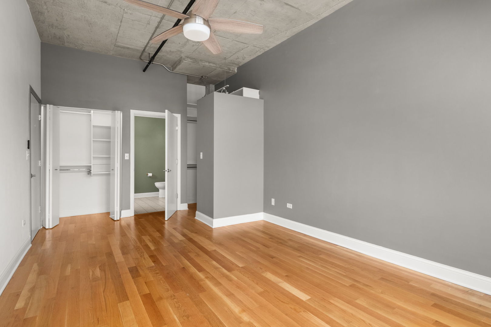 933 West Van Buren Street, Unit 508 Chicago, IL 60607 - Photo 20 of 25 a view of empty room with wooden floor