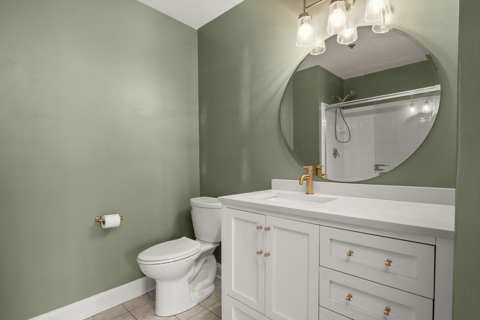 933 West Van Buren Street, Unit 508 Chicago, IL 60607 - Photo 22 of 25 a bathroom with a toilet sink and mirror