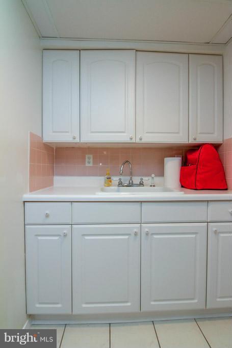 1924 Ormand Road Baltimore, MD 21222 - Photo 22 of 23 Basement Cabinets & Sink