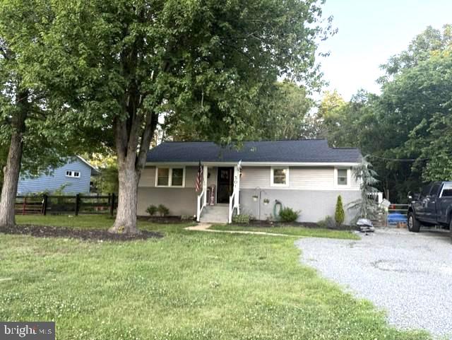 301 North Duey Road Remington, VA 22734 - Photo 1 of 1 Charming home nestled among trees.