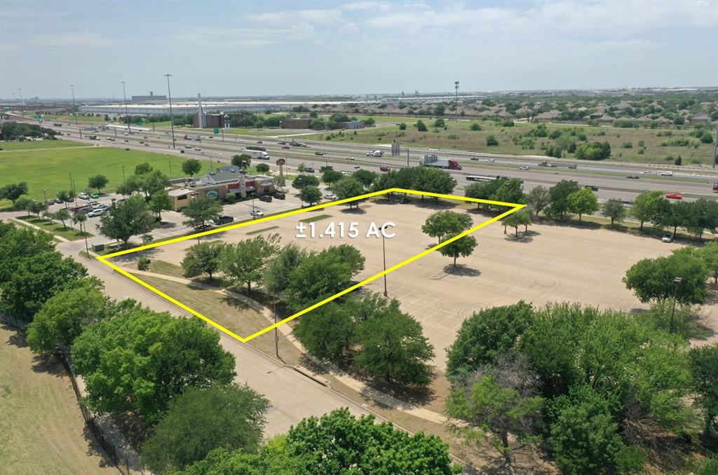5900 North Freeway Fort Worth, TX 76137 - Photo 17 of 23 an aerial view of a house with a swimming pool and outdoor seating