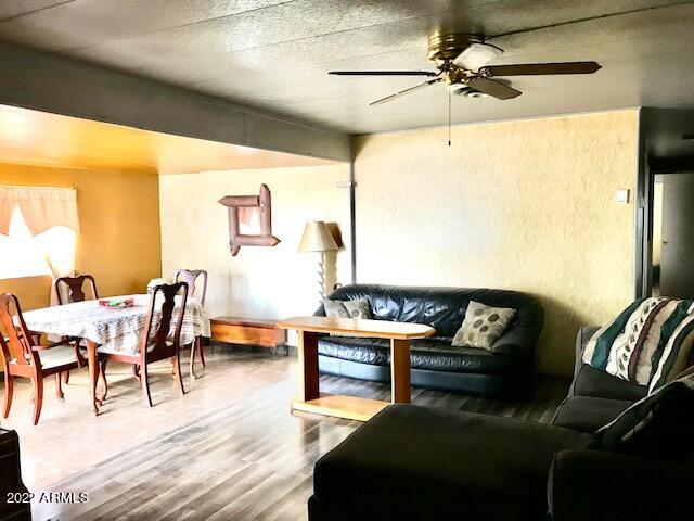 5201 West Camelback Road, Unit F207 Phoenix, AZ 85031 - Photo 4 of 17 LIVING AREA TO DINING OFFICE BONUS ROOM