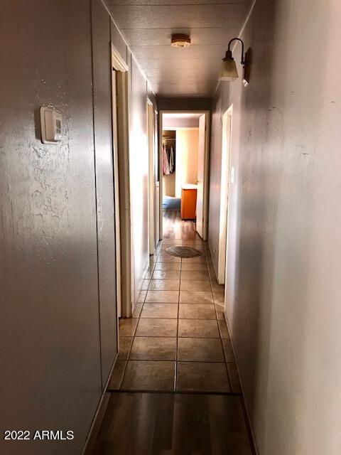 5201 West Camelback Road, Unit F207 Phoenix, AZ 85031 - Photo 8 of 17 HALLWAY TO BATHROOM AND BEDROOMS F207