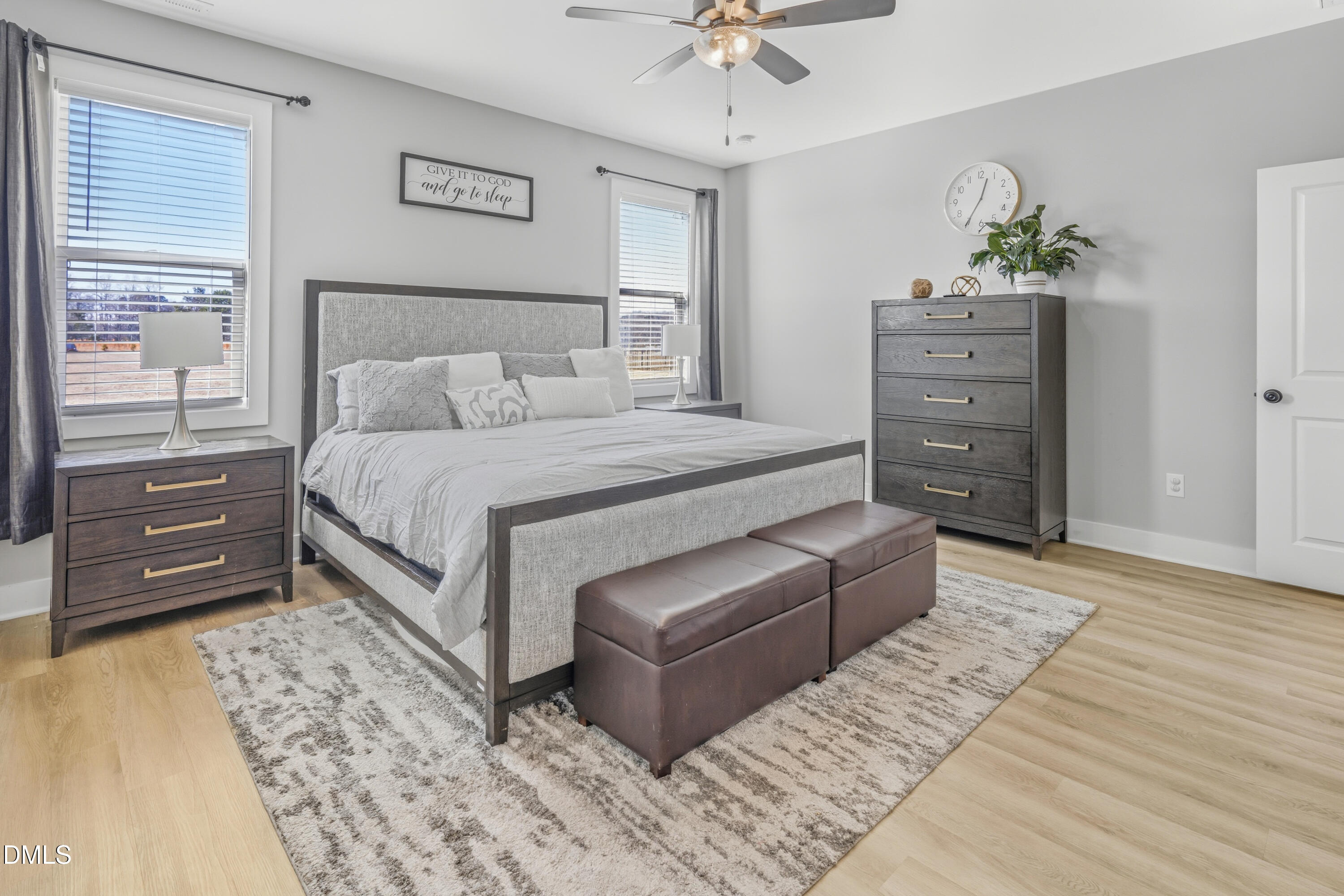 6039 Farmwood Loop Wilson, NC 27896 - Photo 13 of 27 a bedroom with a bed and a dresser