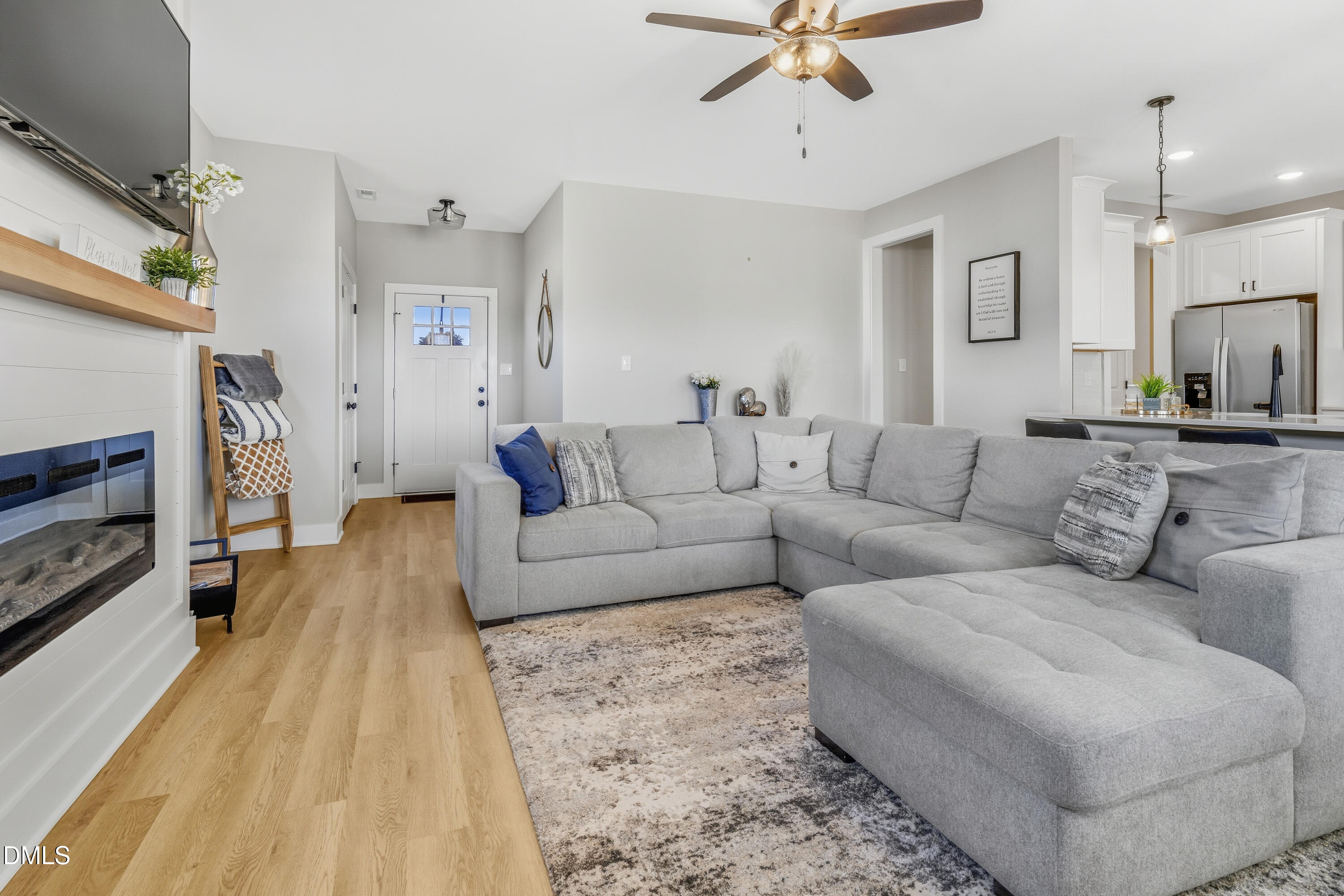 6039 Farmwood Loop Wilson, NC 27896 - Photo 4 of 27 a living room with furniture and a fireplace