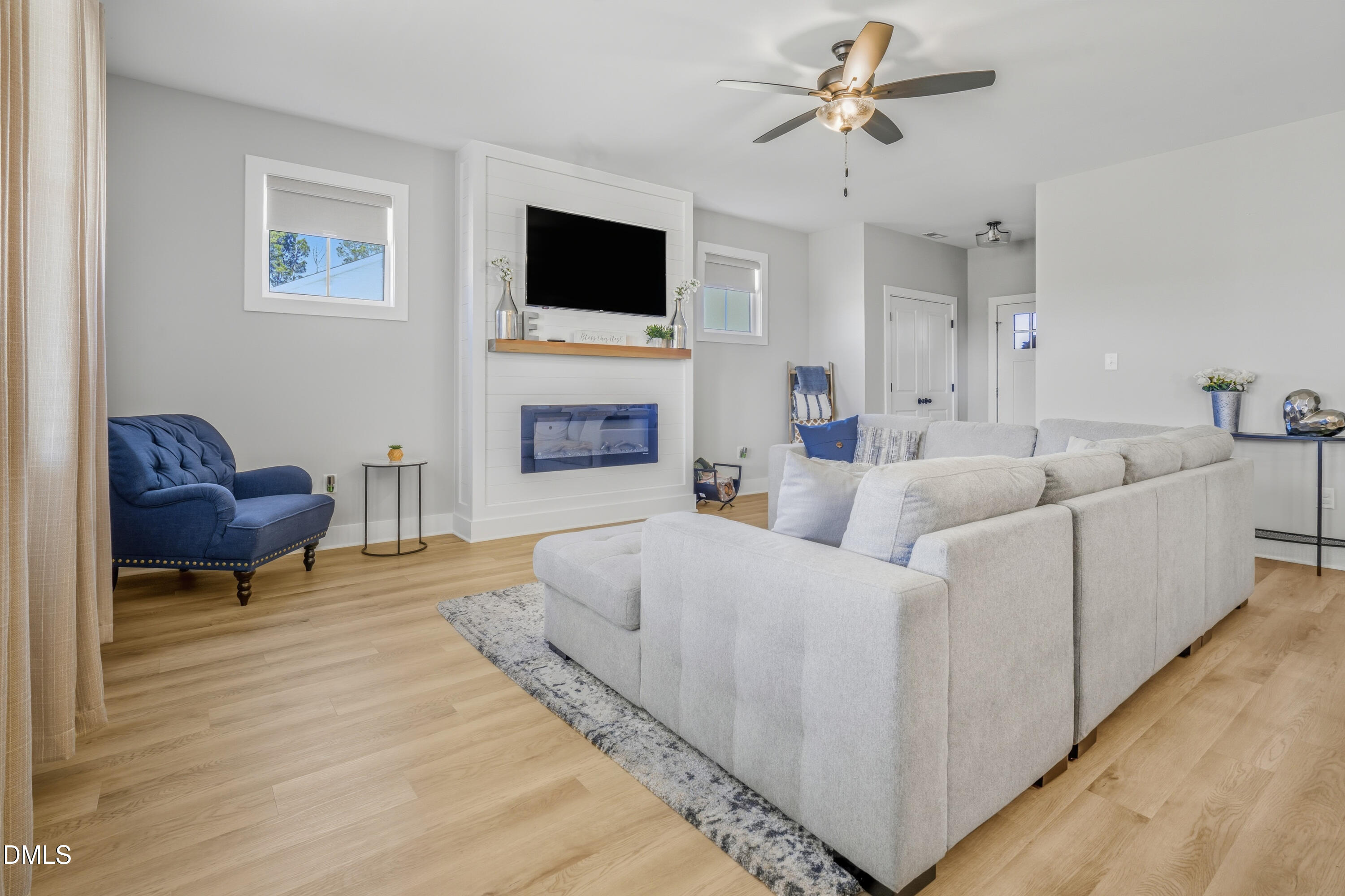 6039 Farmwood Loop Wilson, NC 27896 - Photo 6 of 27 a living room with furniture and a flat screen tv