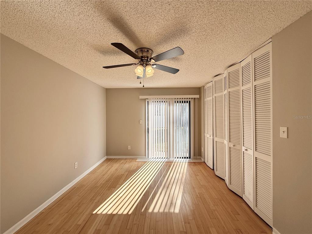 758 Warrenton Road Winter Park, FL 32792 - Photo 29 of 52 wooden floor in an empty room with a window