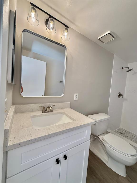 758 Warrenton Road Winter Park, FL 32792 - Photo 34 of 52 a bathroom with a sink a toilet and mirror